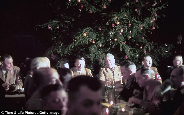 High command: Adolf Hitler and other Nazi officials celebrate Christmas at the Lowenbraukeller restaurant in Munich on December 18, 1941
