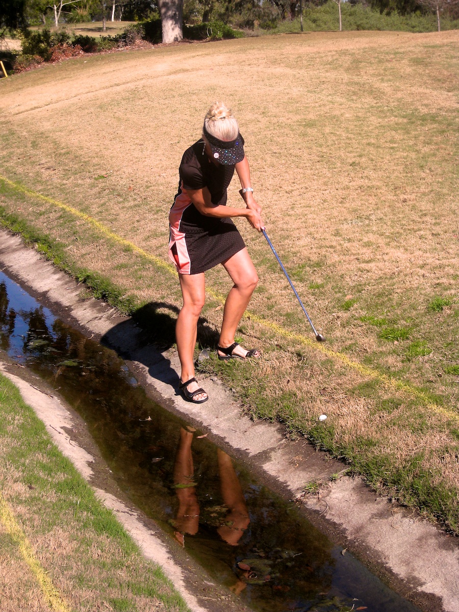 Charlotte makes a terrific golf shot