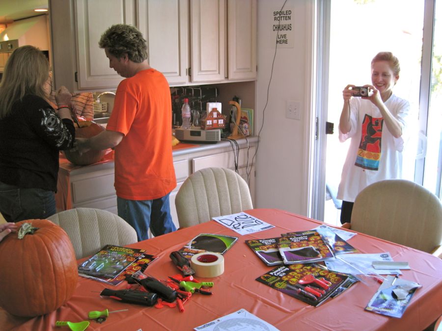 Carving the pumpkins with family at the Liles home