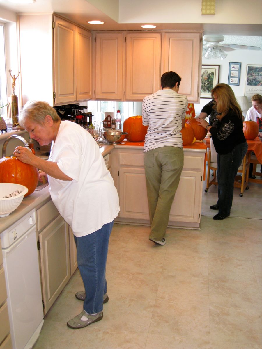 Carving the pumpkins with family at the Liles home