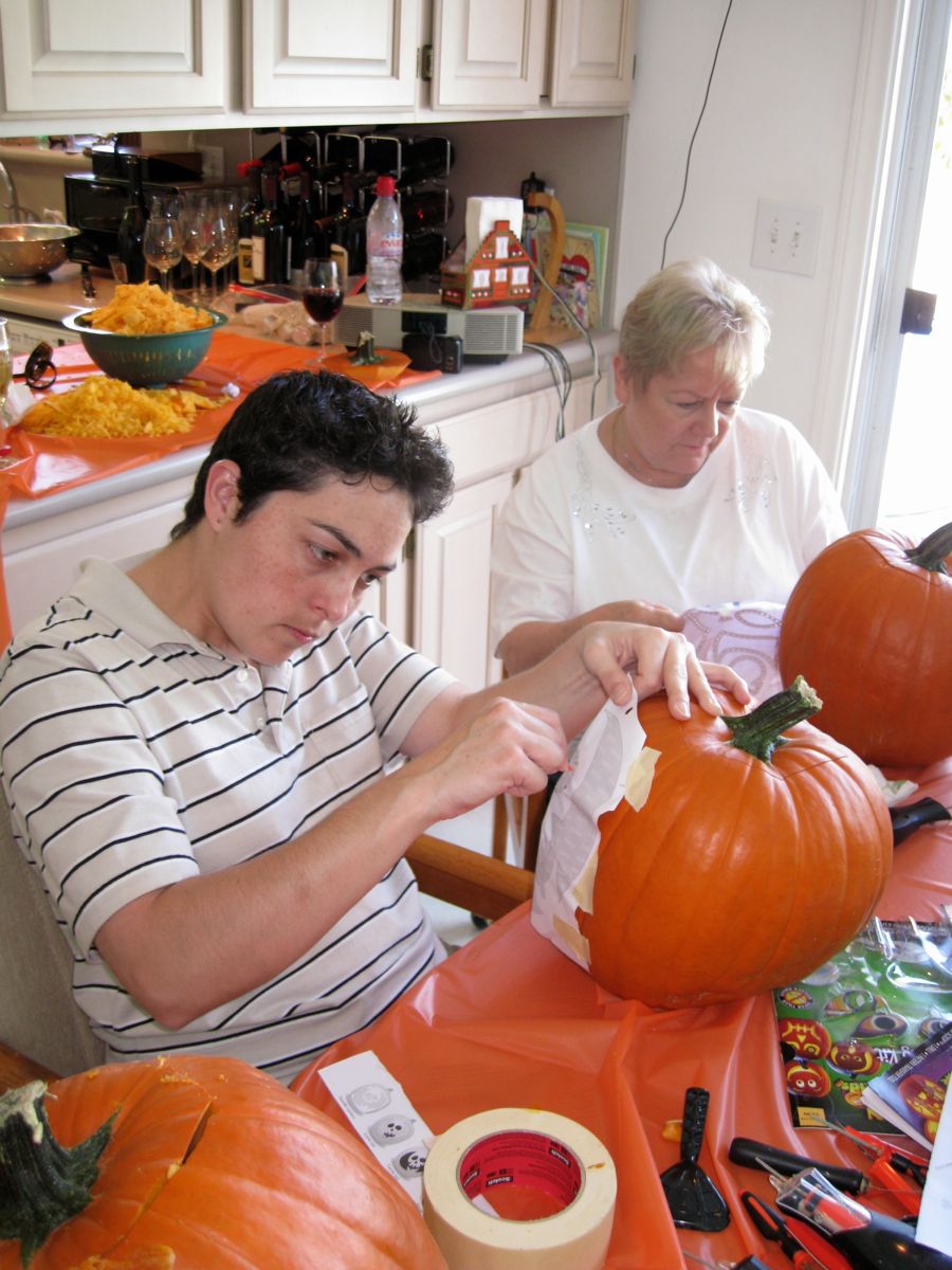 Carving the pumpkins with family at the Liles home