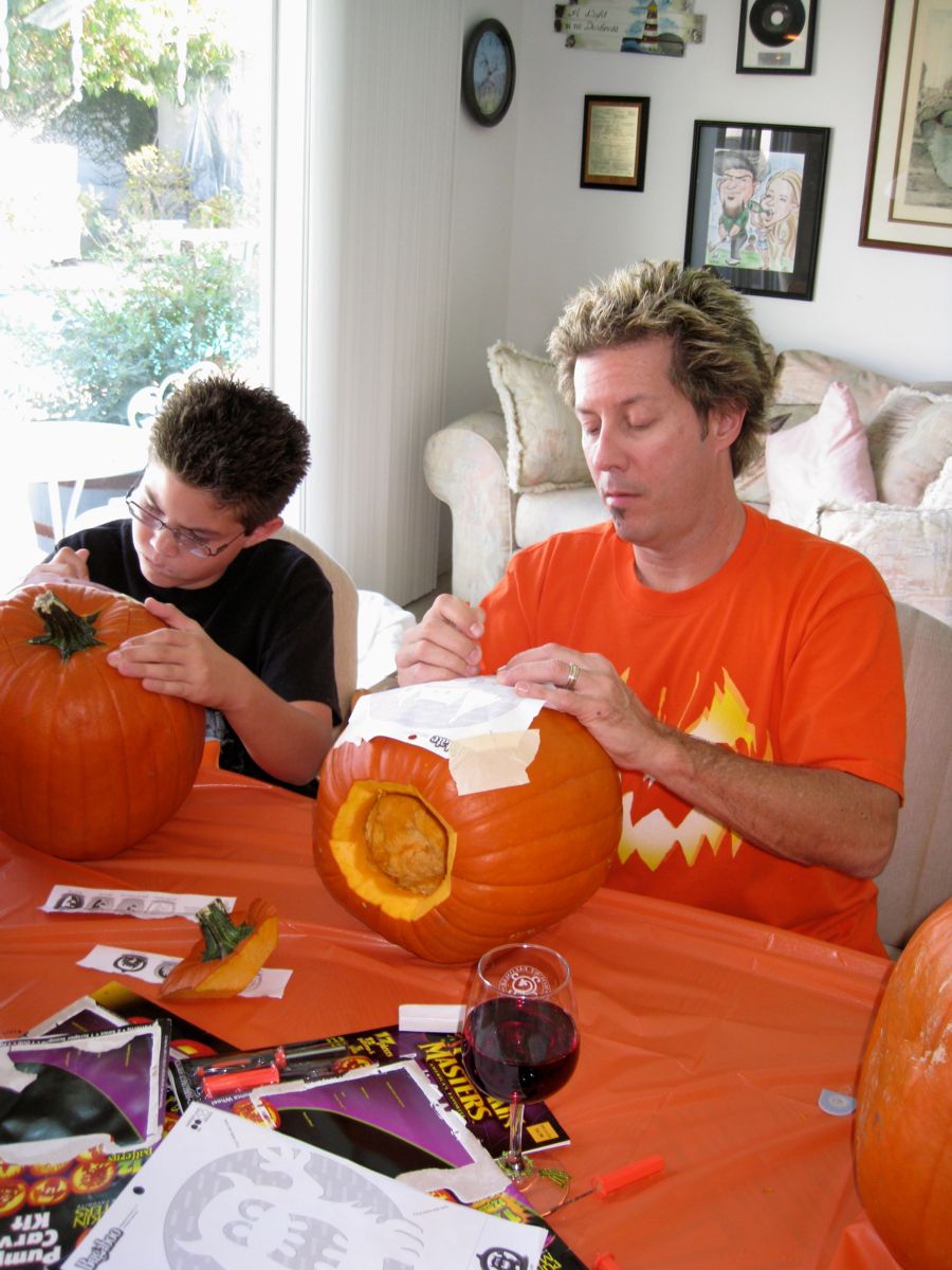 Carving the pumpkins with family at the Liles home