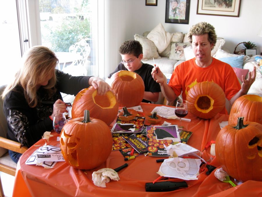 Carving the pumpkins with family at the Liles home