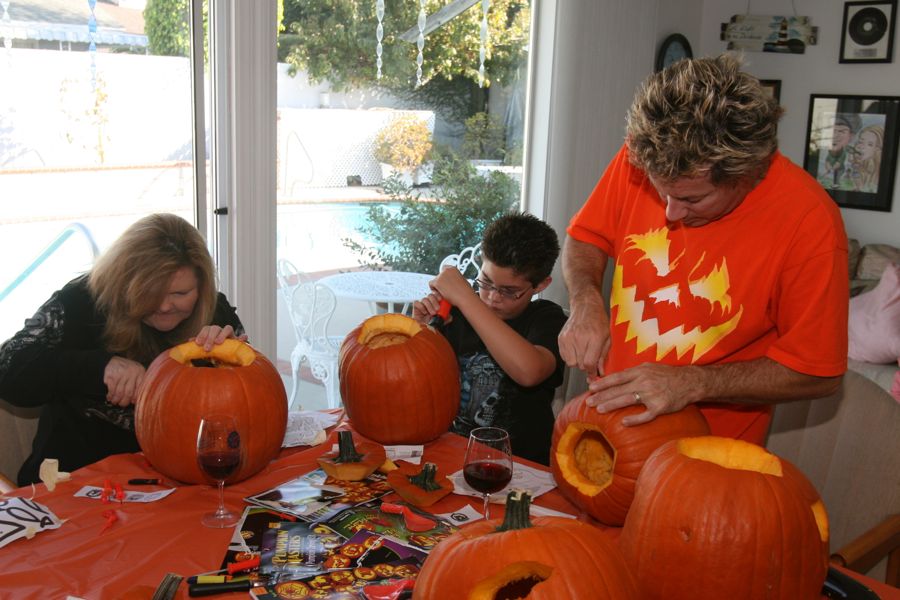 Carving the pumpkins with family at the Liles home