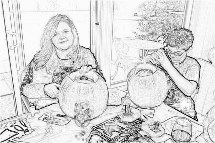 Carving the pumpkins with family at the Liles home