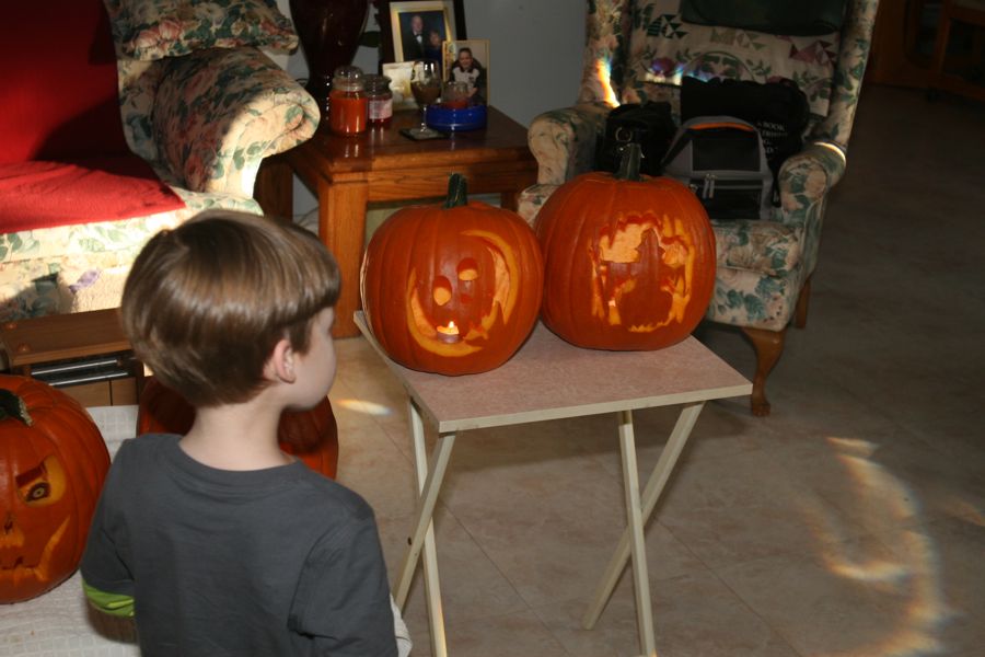 Carving the pumpkins with family at the Liles home