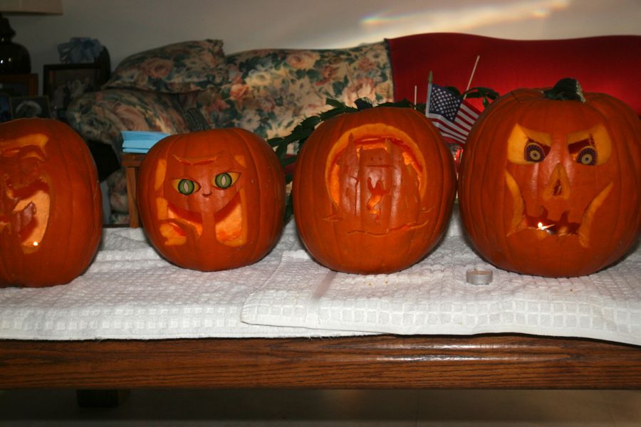 Carving the pumpkins with family at the Liles home