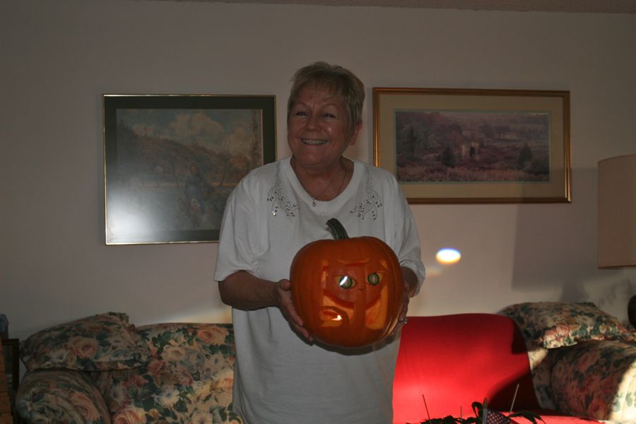 Carving the pumpkins with family at the Liles home