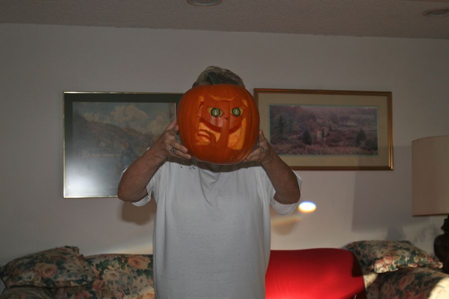 Carving the pumpkins with family at the Liles home