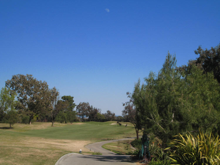 The moon was just hanging about the 13th hole