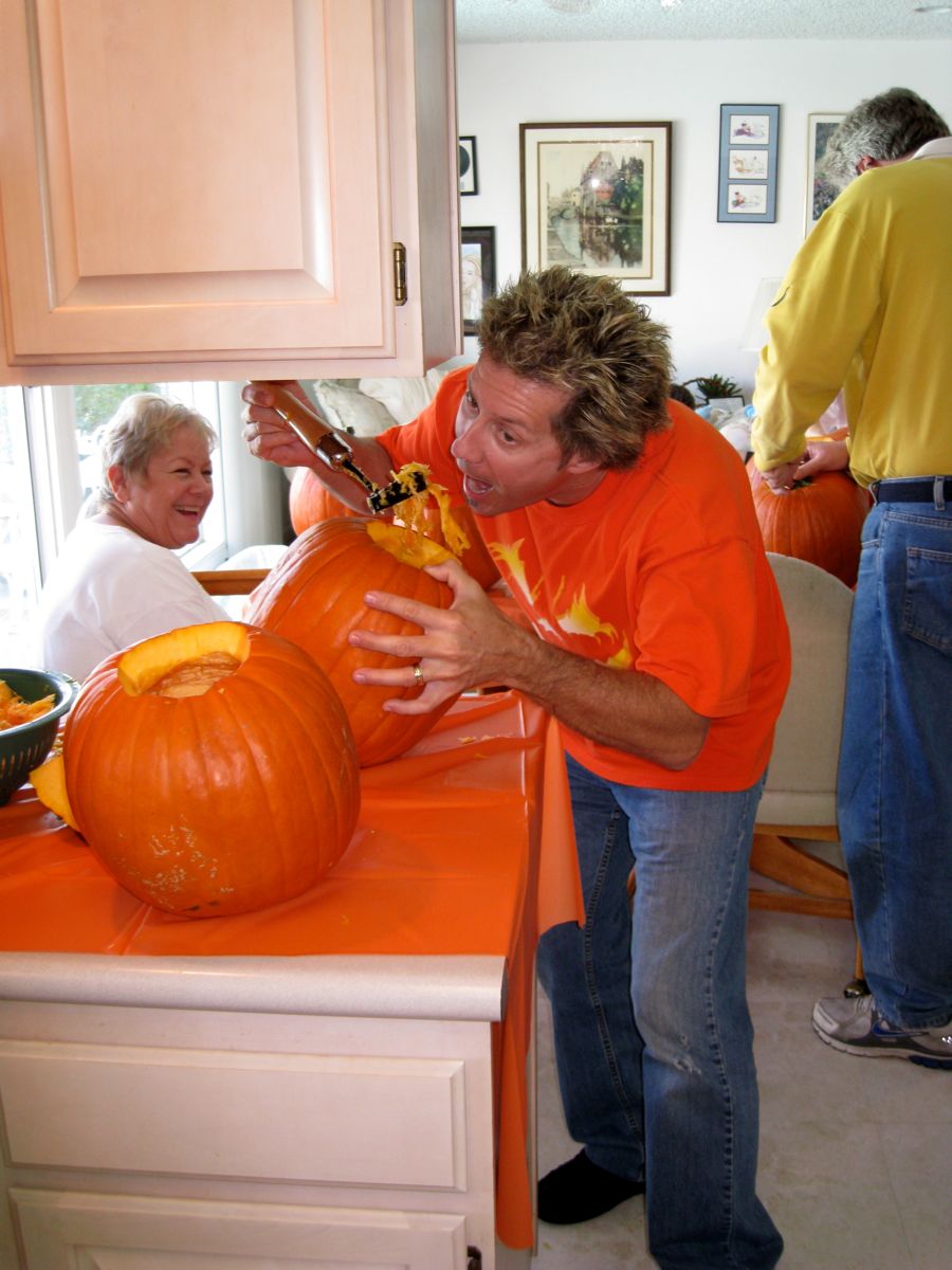 Carving the pumpkins with family at the Liles home