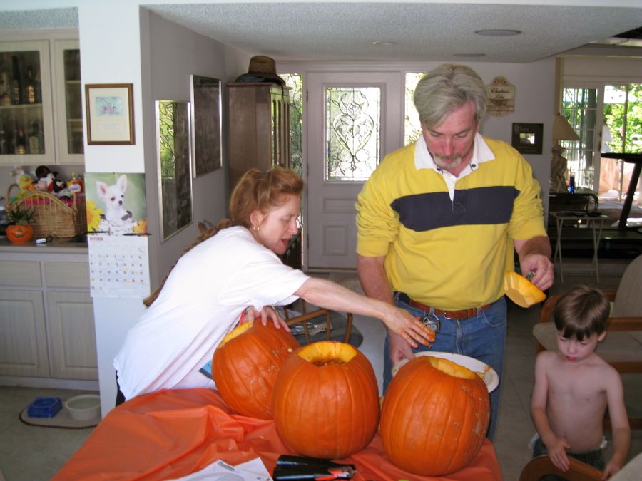 Carving the pumpkins with family at the Liles home