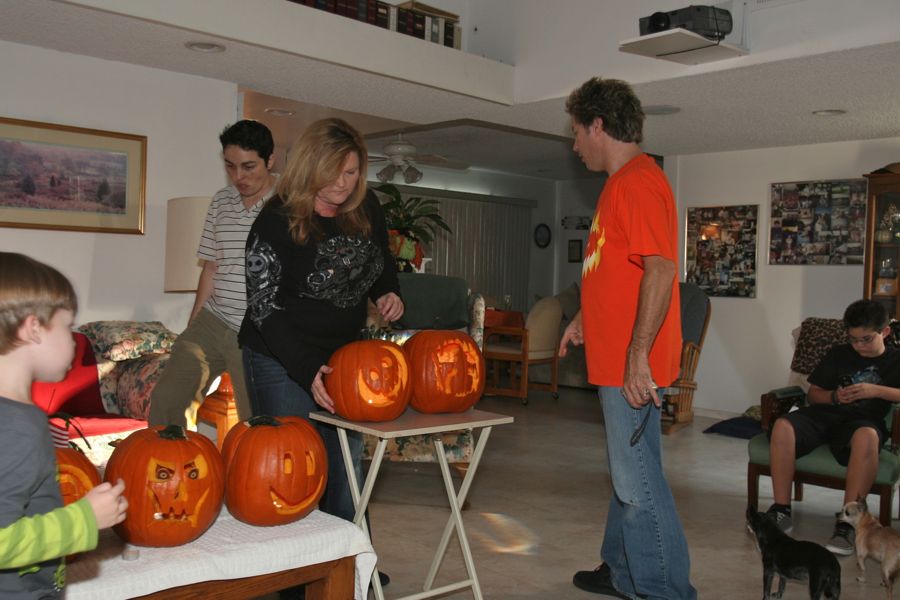 Carving the pumpkins with family at the Liles home