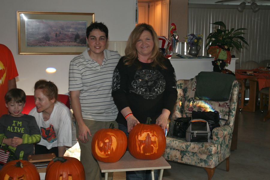 Carving the pumpkins with family at the Liles home