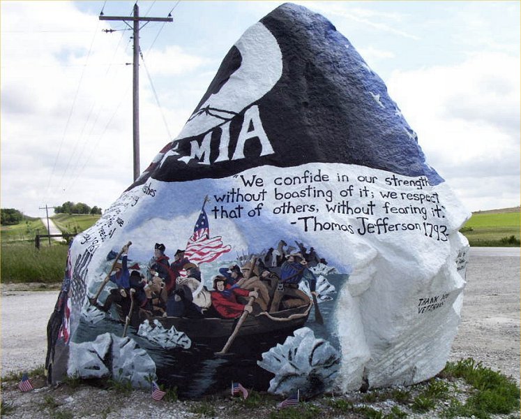 Bubba paints rocks